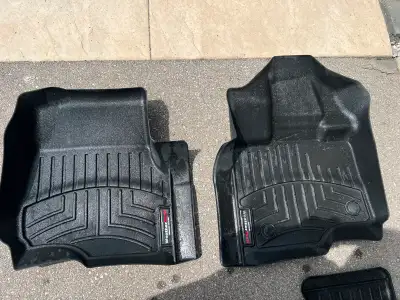 Weather tech floor mats. 2010 and up. Give them a wash and like new.