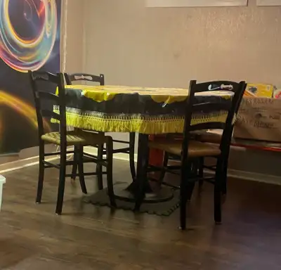 Table, tablecloth, and chairs, View more
