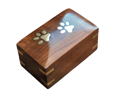 This Pet Urn named 'Cute Paws on Wood' is a Box Cremation Urn made of Sheesham wood (Indian Rosewood...