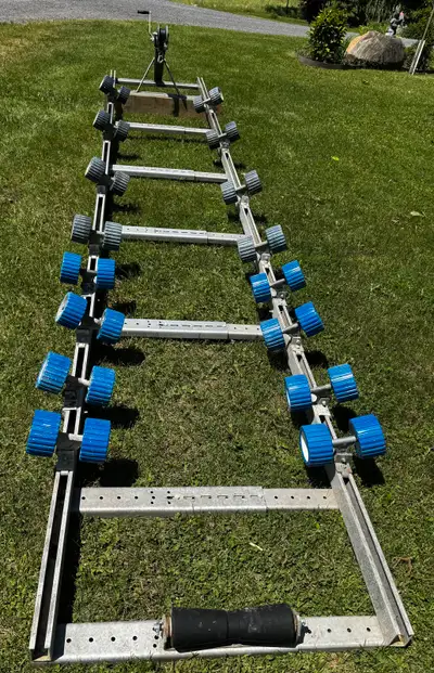 18 foot aluminum boat roller ramp. Hand winch can be replaced with an electric winch. Used with a 16...