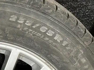 Four 235-65-17 Michelin X-Ice winter tires/snow tires and BMW Rims. 17x8 Rim - Authentic BMW complet...