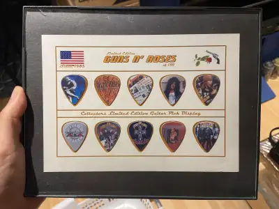Selling a limited edition Guns N' Roses guitar pick display! It's a collector's item featuring a set...