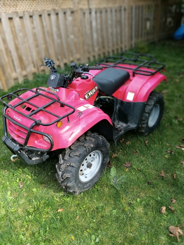 SUZUKI EIGER 400 4X4 WITH OWNERSHIP. WORKS GREAT ATVs Kawartha