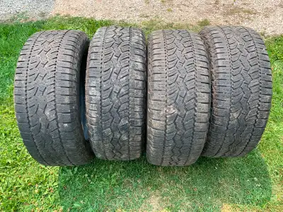 Selling set of used Falken Wildpeak A/T Raised white letter tires 275 55 R20. Two tires approximatel...
