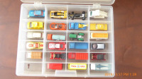 35 Tomica 1/64th scale die-cast cars, loose, in Penticton