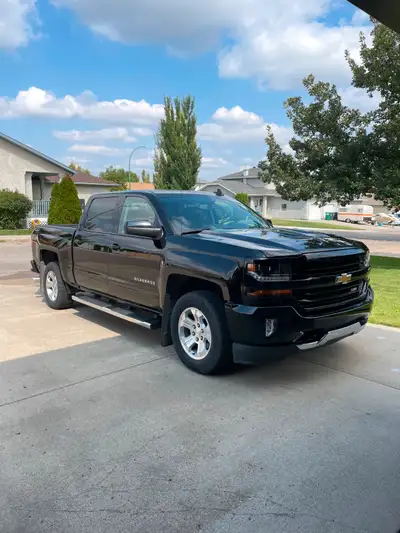 Black 2017 Chevrolet Silverado LT/Z71 - 1500 Crew Cab/SWB - 4WD/5.3L engine. Sprayed in box liner. N...