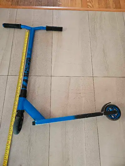 Kids trick scooter Suitable for 8 to ten year old Quiet, non - folding Wheels and body in good condi...