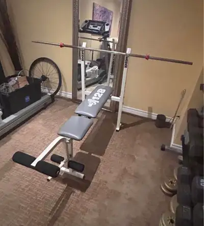 125 pounds of weight Bench and bar Burlington pick up