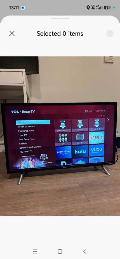 TCL 32" FHD Roku Smart TV .works great ! Remote and legs include, View more
