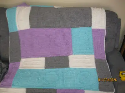 Hand made afghan 48"L x 44"W "Love you More" stiitched into pattern. sf home. In LIstowel. pickup on...