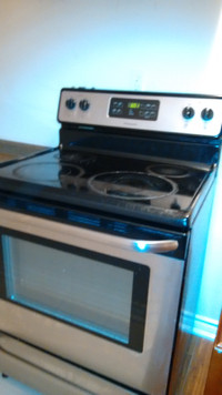 Freestanding Frigidaire Glass Top Electric Stove 30 inch width.