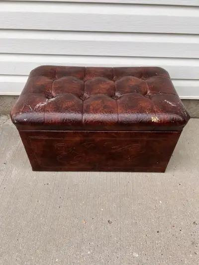 Vintage storage leather ottoman. Asking $40.00. Final price. Email. Cash only. Thanks for looking.
