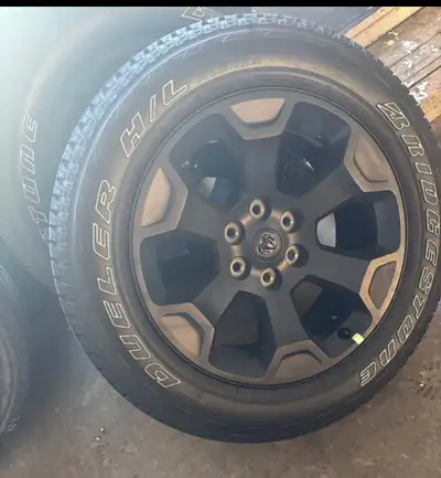 Bridgestone Dueler H/L 275/55R20 with 20inch black RAM rims (OEM) Brand new. Taken off a new Ram on...