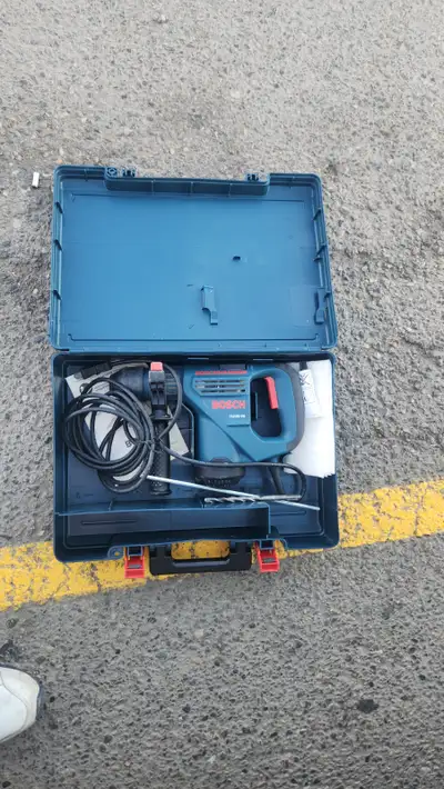 like new bosch hammer drill/case/bits 200 cash can drill 1", View more