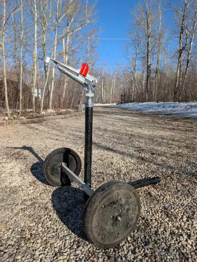 2" sprinkler on wheels. This is a heavy duty sprinkler that is excellent for acreages to establish n...