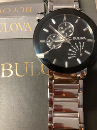 Bulova futuro silver and gold day date watch