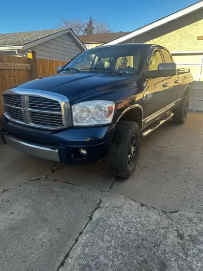 2008 Dodge quad cab four-wheel-drive with 67 Cummings diesel