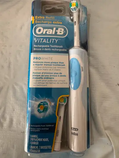 Oral-B Vitality Pro White Electric Toothbrush, NEW SEALED PACKAGE CHARGING CRADLE 2 REPLACEMENT HEAD...