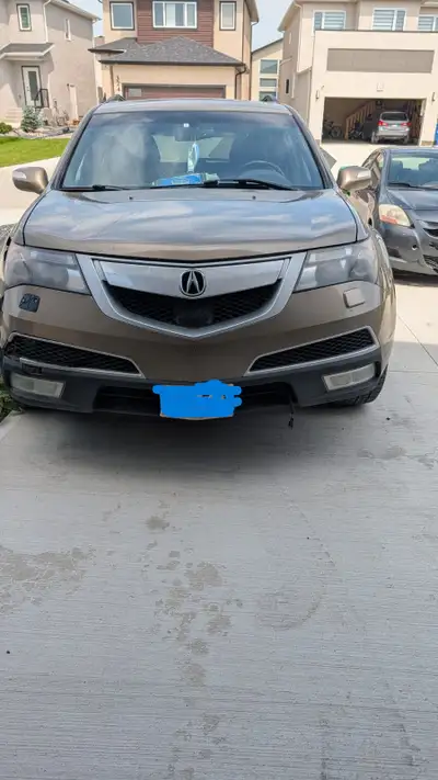 2010 Acura MDX – 7-Passenger SUV – $7,500 Selling my 2010 Acura MDX as is. Mileage: 252,000 km Rebui...