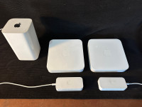 Trois routers fonctionnels Apple à donner.