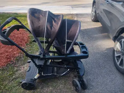 I'm selling a Graco Ready2Grow double stroller that's perfect for families with twins or kids of dif...