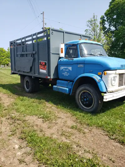 1968 Ford N600 with working dump box. Truck runs but needs break line and booster. Can be driven on...