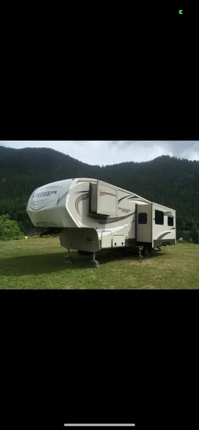 Great condition two slide outs call 250 608 0488 30 amp power outdoor kitchen and outdoor shower two...