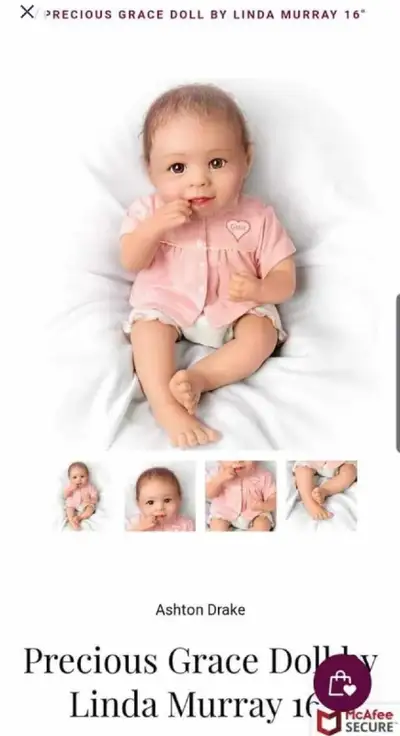 I am selling an Ashton Drake doll, named Precious Grace by Linda Murray, 16" baby doll. She is craft...