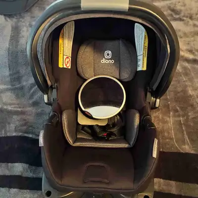 Diono infant car seat used for 7 months. In good condition! Base and mirror included. Accident free....