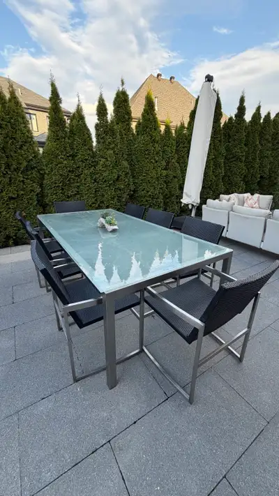 outdoor dining table and 8 chairs., View more