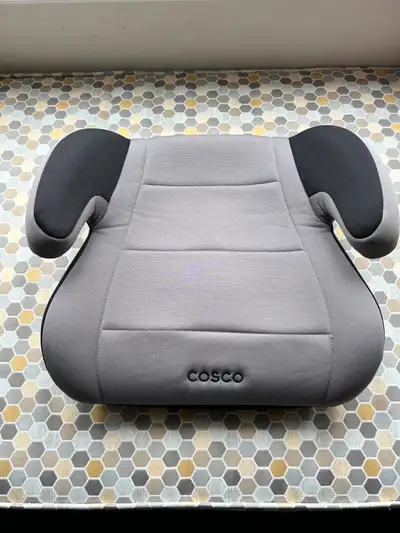 - Lightweight Cosco booster seat. - great condition.