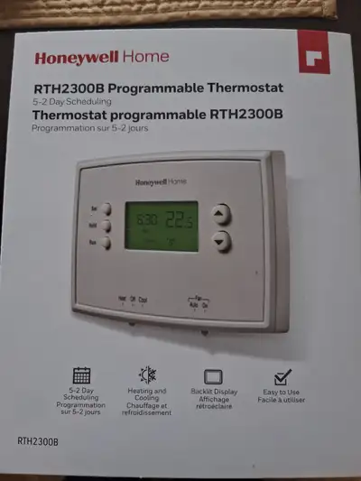 New programmable thermostat, View more