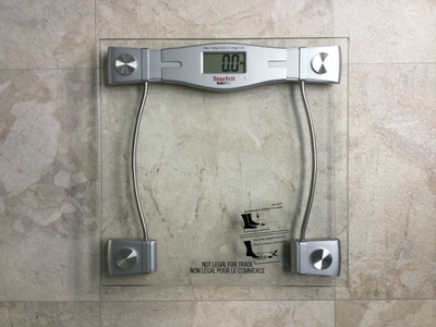Electronic glass bathroom scale. Starfrit, purchased from Canadian Tire for $35.99. Imperial or metr...