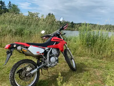 I'm selling my 2009 Kawasaki KLX250s, a versatile dual-sport motorcycle perfect for both on and off-...