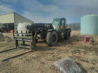 2002, 11000lb skytrax.4 attachments. $54499. 780-446-3848