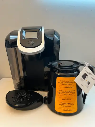 Almost Brand New_Keurig Coffee Maker with Brand New Carafe, View more