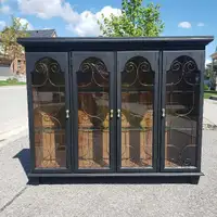 A STUNNING REFINISHED BASSETT DISPLAY CABINET