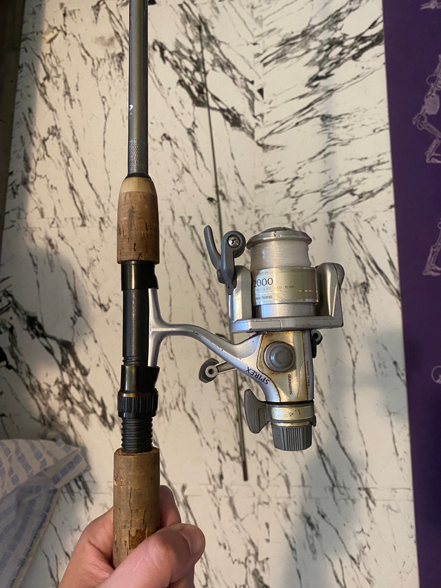 crystal river cahill cr335x fishing rod with shimano spirex 200