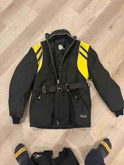Vintage snowmobile suit. Matching pants and coat. Size Large Tall In like new condition, barely worn...