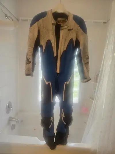 Joe Rocket Leather and Kevlar one piece motorcycle racing suit for sale. It is a size 44. The outsid...