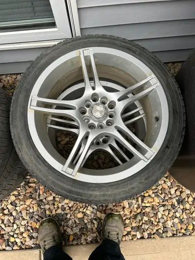 Aluminum Rims/Michelin X-Ice(215/45R18)tires with 5/32 tread left(new 10/32). Multi Bolt pattern Rim...