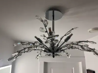 Illuminate your space with this stylish LED light chandelier, featuring a modern design with crystal...