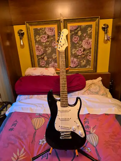 •	Fender Squier Mini electric guitar, View more