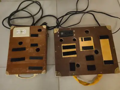 2 Guitar pedalboards c/w carrying handle and receptacle for plugging in power supplies and amp. Vint...