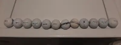 13 used golf balls, View more