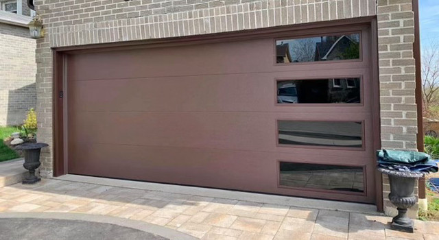 Garage doors with walk through  in Garage Doors & Openers in Oshawa / Durham Region