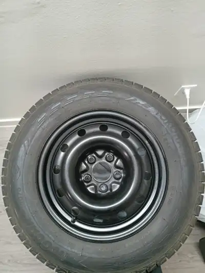 Selling a set of four Yokohama winter tires mounted on steel rims. Purchased new in November 2024 an...