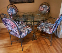 Glass top dining table wrought iron  with 4 matching chairs