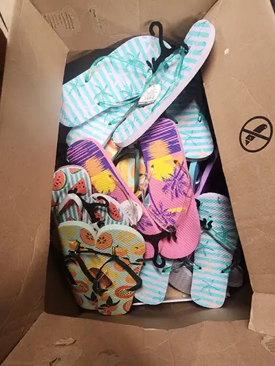 Assorted pairs of flip flops!, View more