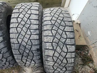 LT275 65 18 GOODYEAR WRANGLER TERRITORY . Have 2 tires for sale. Load range C. Both are a little sca...